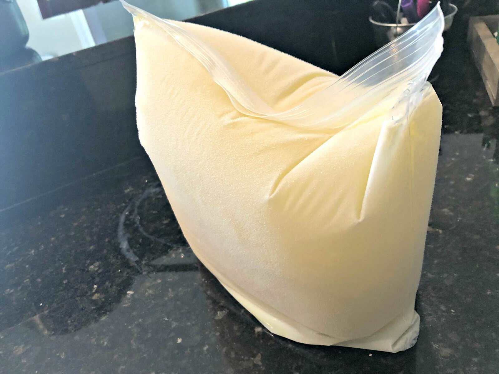 frozen milk blob in a ziploc bag